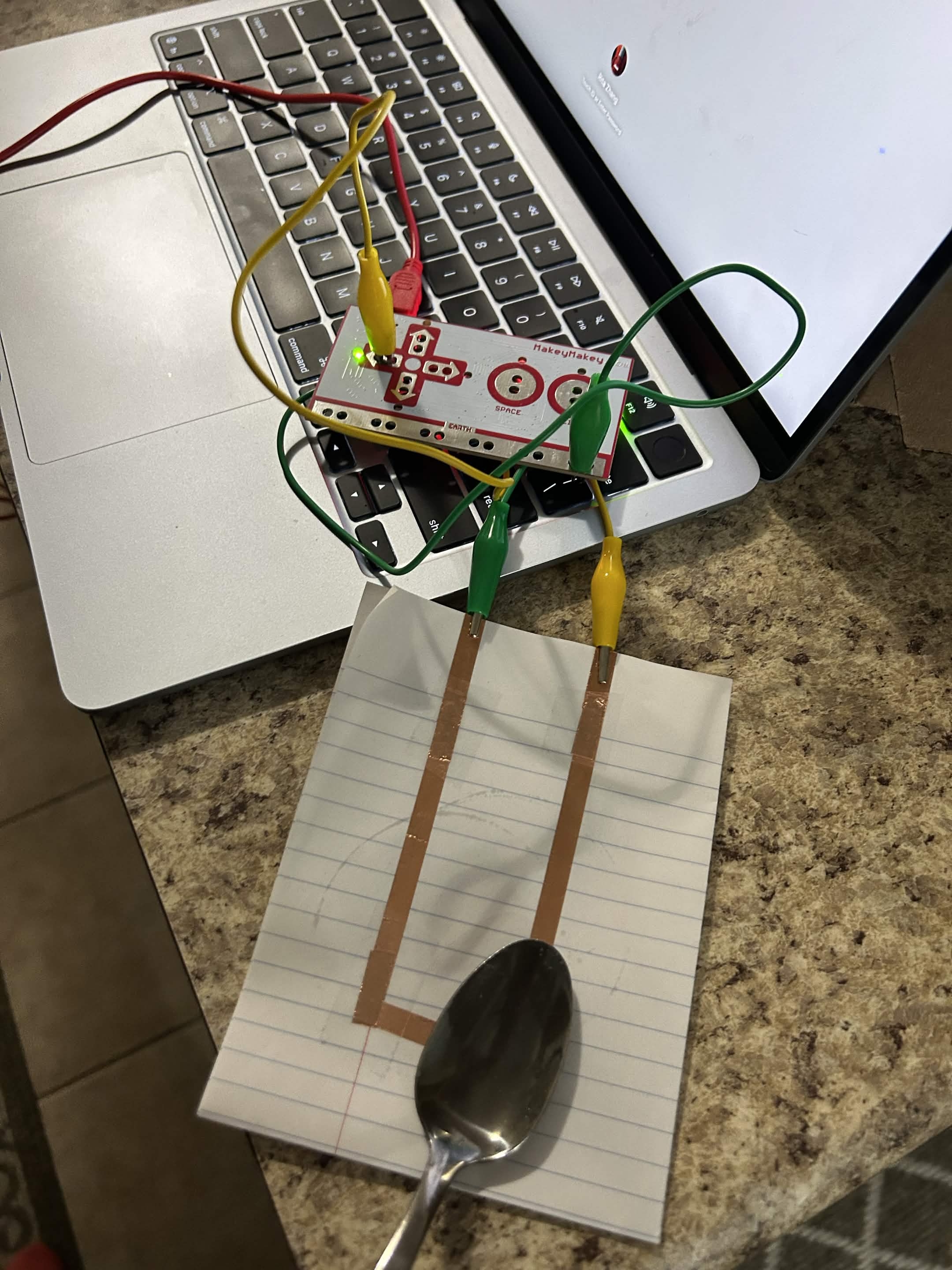 I closed the circuit with a spoon.