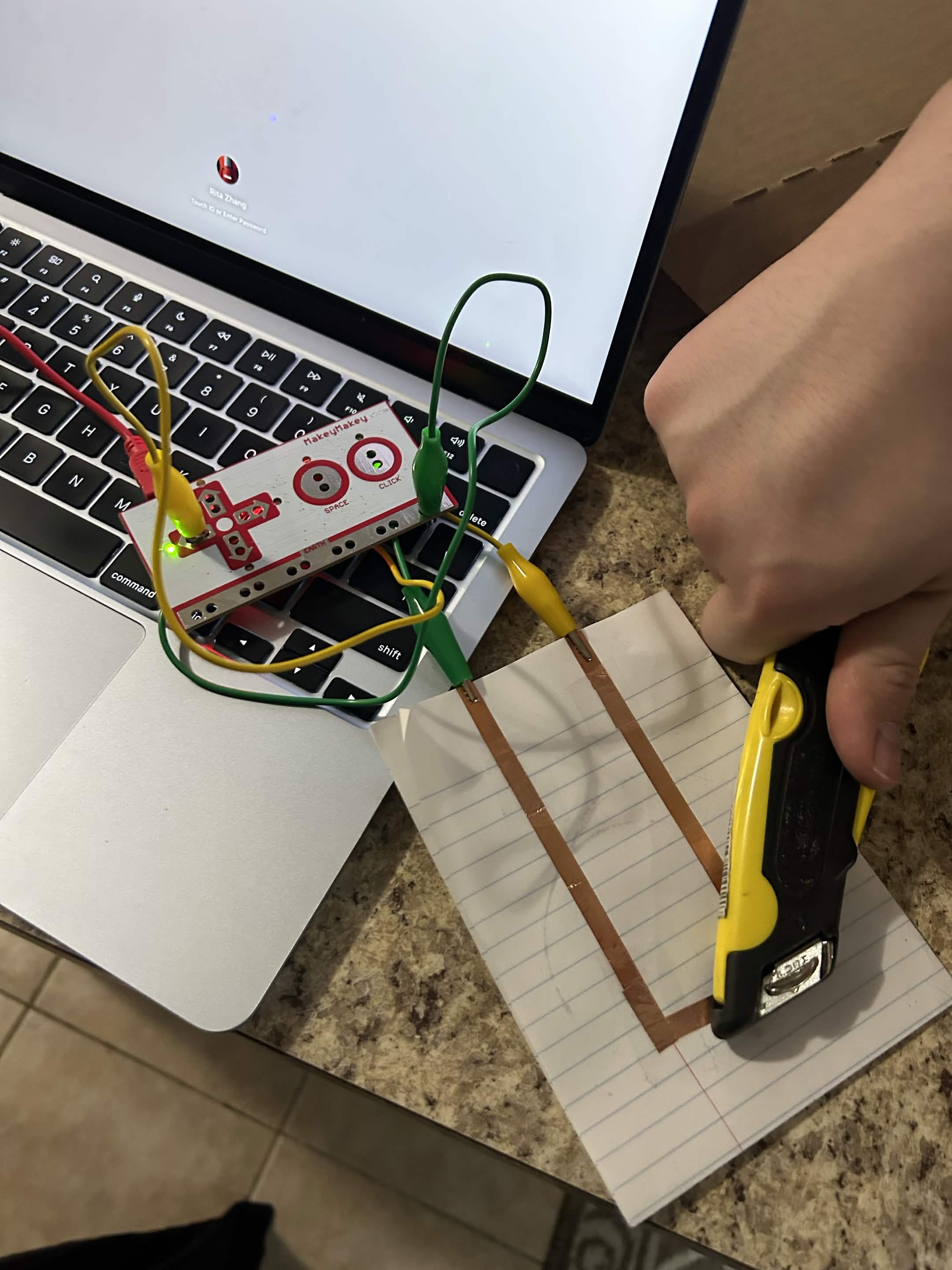 I closed the circuit with an exacto knife.