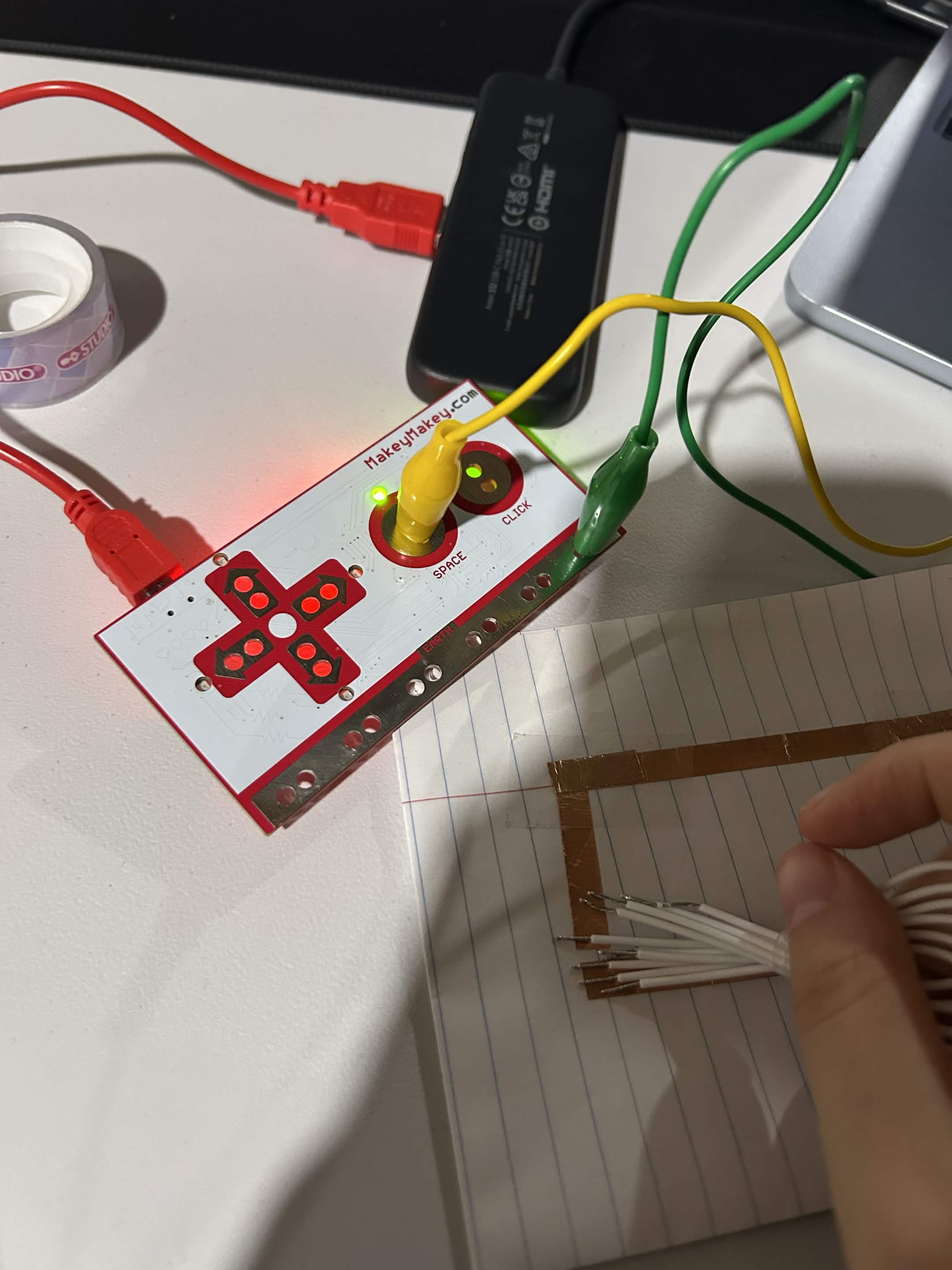 I closed the circuit with the wires we were given that came with the makey makey.